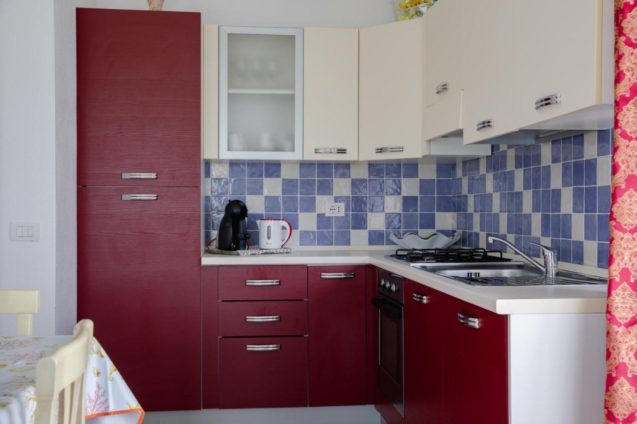 Le Residenze Di Baia Sant'Anna Villa Tanaunella Bagian luar foto