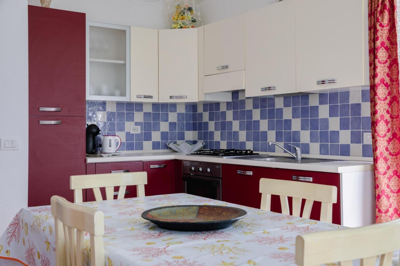 Le Residenze Di Baia Sant'Anna Villa Tanaunella Bagian luar foto