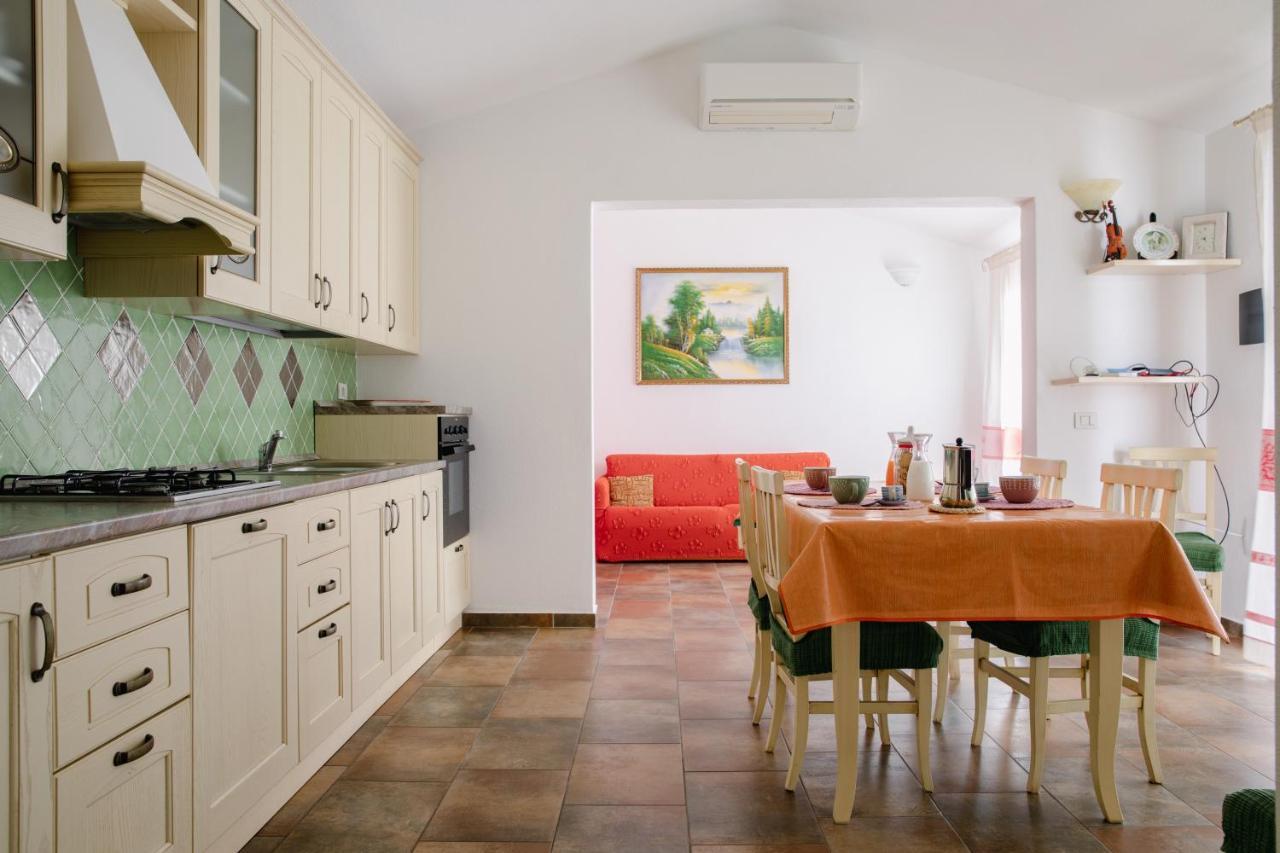 Le Residenze Di Baia Sant'Anna Villa Tanaunella Bagian luar foto