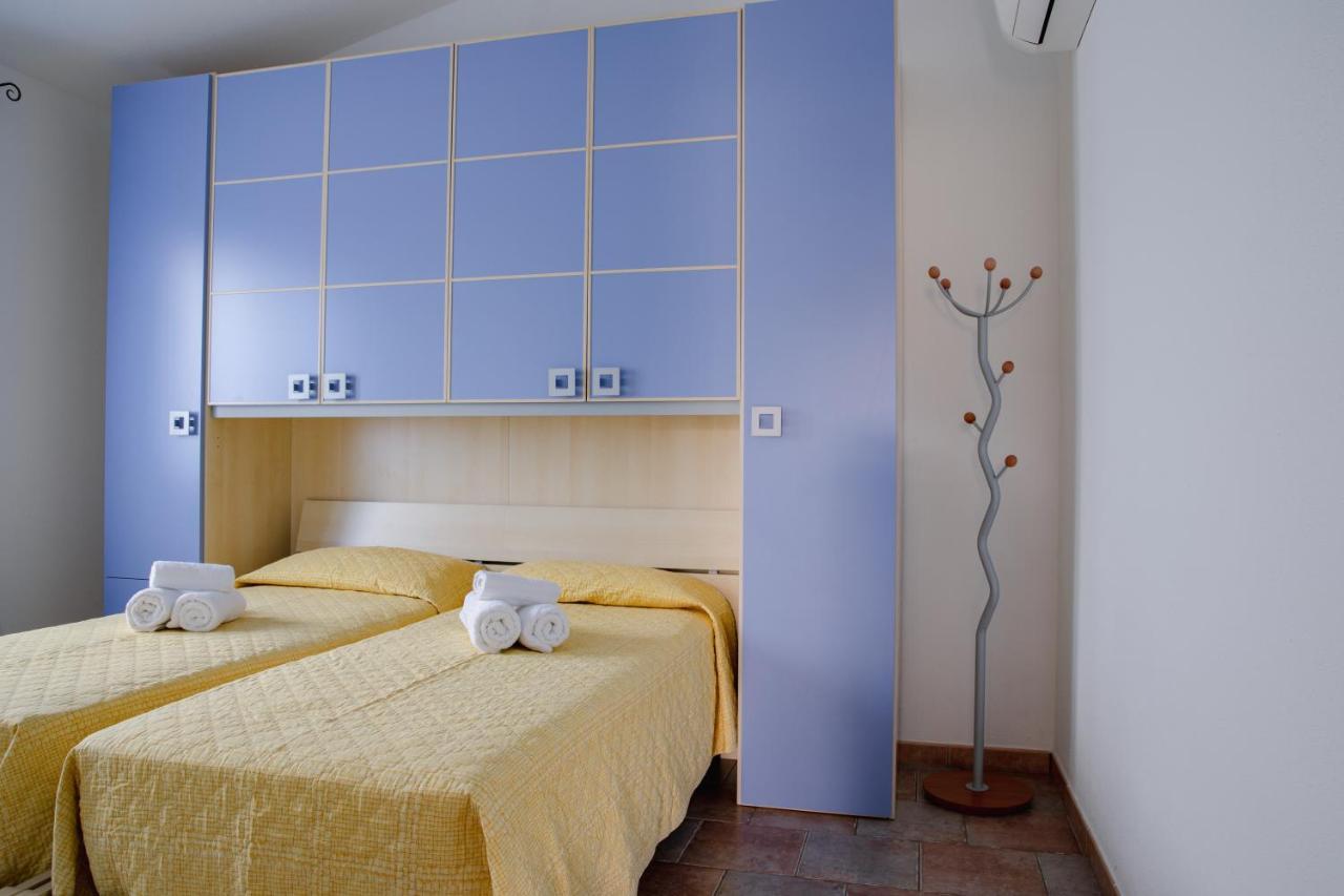 Le Residenze Di Baia Sant'Anna Villa Tanaunella Bagian luar foto