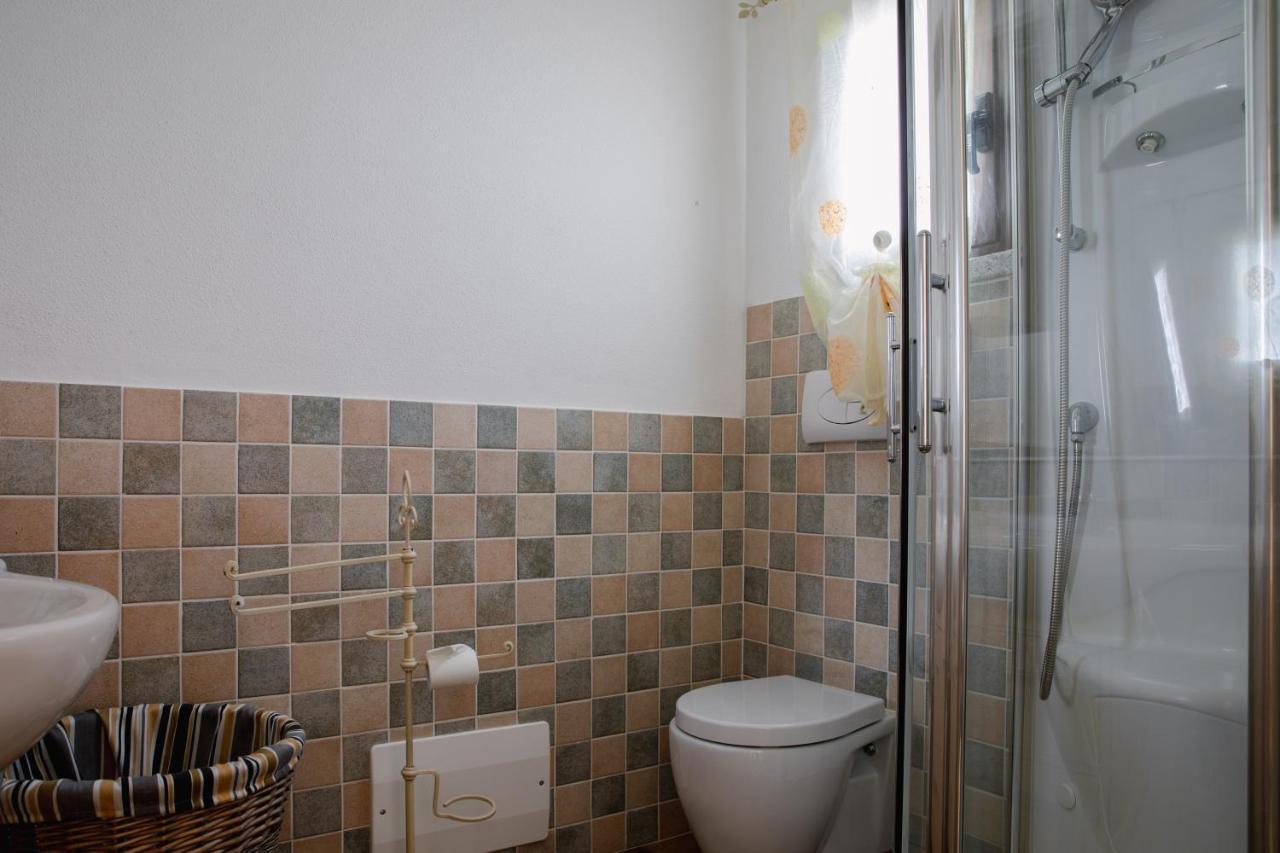 Le Residenze Di Baia Sant'Anna Villa Tanaunella Bagian luar foto