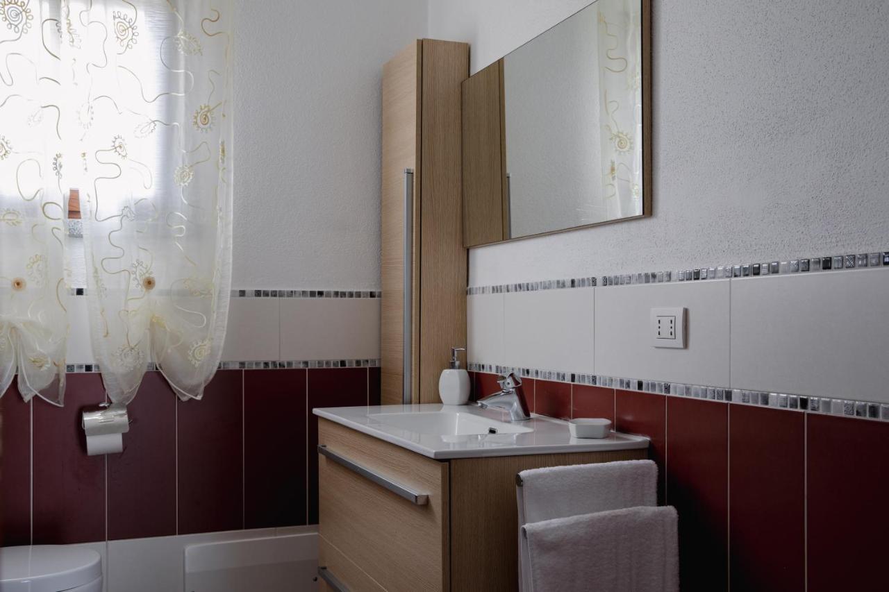 Le Residenze Di Baia Sant'Anna Villa Tanaunella Bagian luar foto